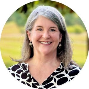 Candace Blades wears a black and white patterned top