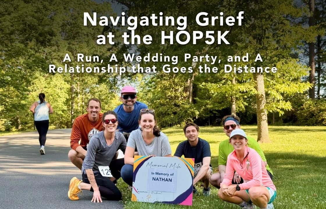 A groups young runners gather around a sign reading "Memorial Mile: In Memory of Nathan"